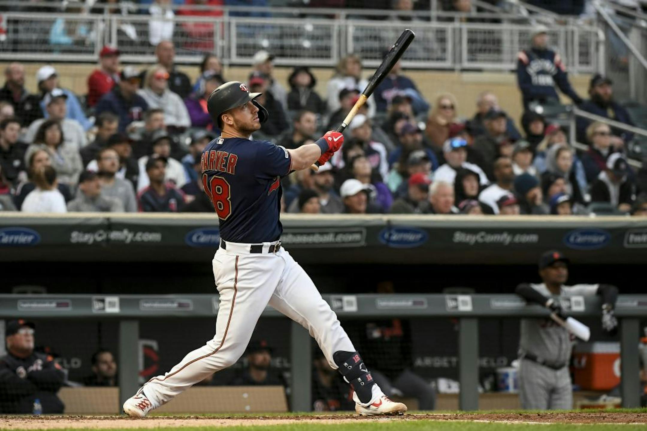 Minnesota Twins catcher Mitch Garver (18) hit a triple in the bottom of the third inning, bringing center fielder Byron Buxton in for a run.