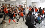 Hannah Johnson, a senior, front left, joined a couple dozen students from the Perpich Center for Arts Education who danced in unison to celebrate Unit