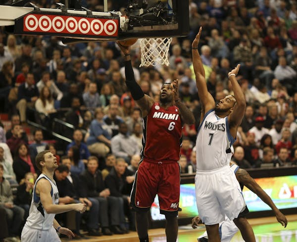 Miami's LeBron James made an easy first quarter layup past the defense of Minnesota's Derrick Williams