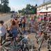 A crowd gathers to check out a collection of cruiser bikes at Lakeshore Bike Shop in Marquette, Mich.&#xa0;