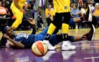 Lynx center Sylvia Fowles eyes the ball after turning it over to the Los Angeles Sparks in the second half