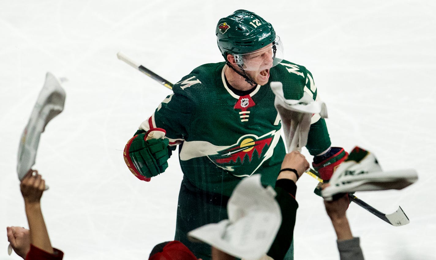 Eric Staal celebrated Sunday after scoring a goal in the second period.