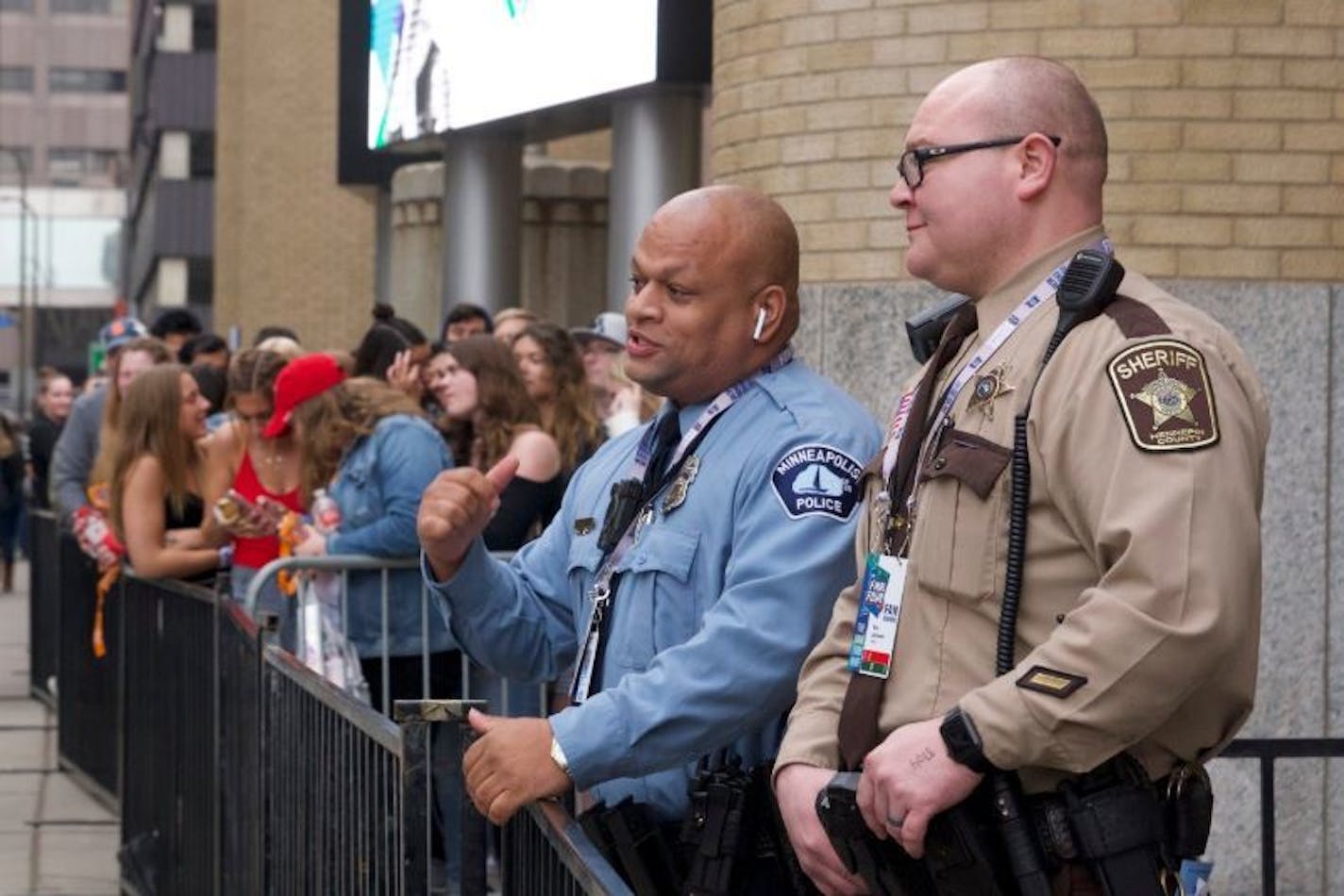 A Minneapolis police officer and a Hennepin County sheriff were on duty outside of the Armory on Friday.