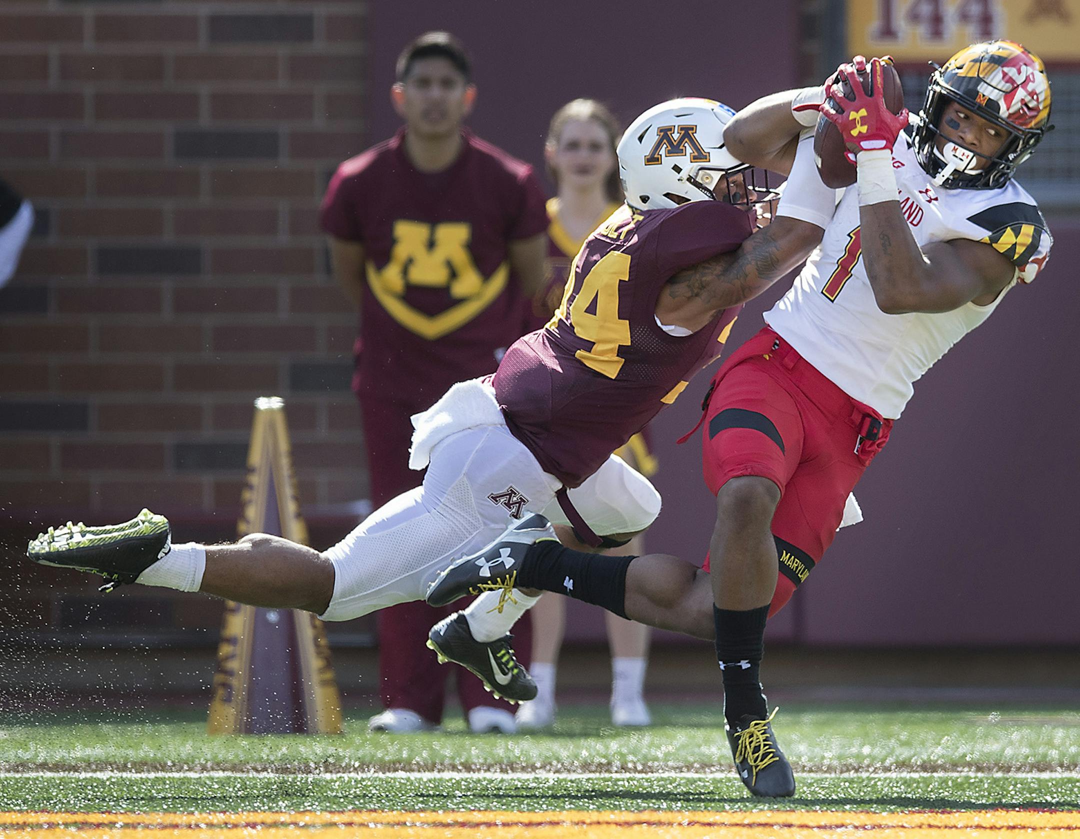 Maryland's wide receiver D.J. Moore hauled in a touchdown pass despite the defensive efforts of Minnesota's defensive back Antonio Shenault during the second quarter as the Gophers took on Maryland at TCF Bank Stadium, Saturday, September 30, 2017 in Minneapolis, MN. ] ELIZABETH FLORES ï liz.flores@startribune.com