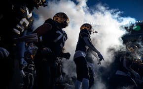 Gophers players take the field before the start of a football game between the University of Minnesota Gophers and the Maryland Terrapins Saturday, Oc