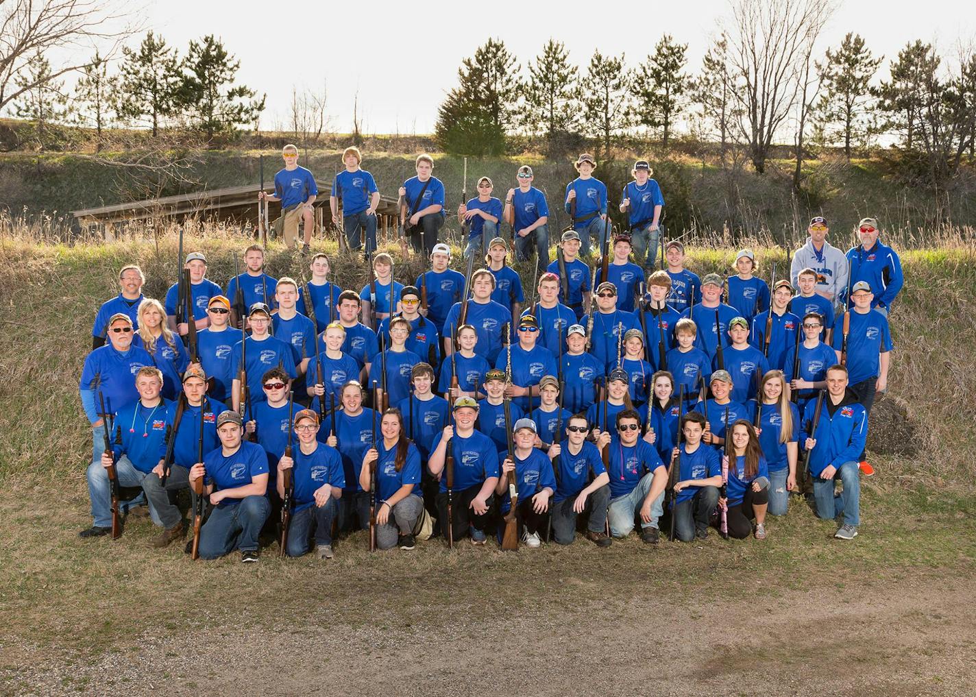 A photo posted on its public Facebook page shows the Big Lake High School trapshooting team.