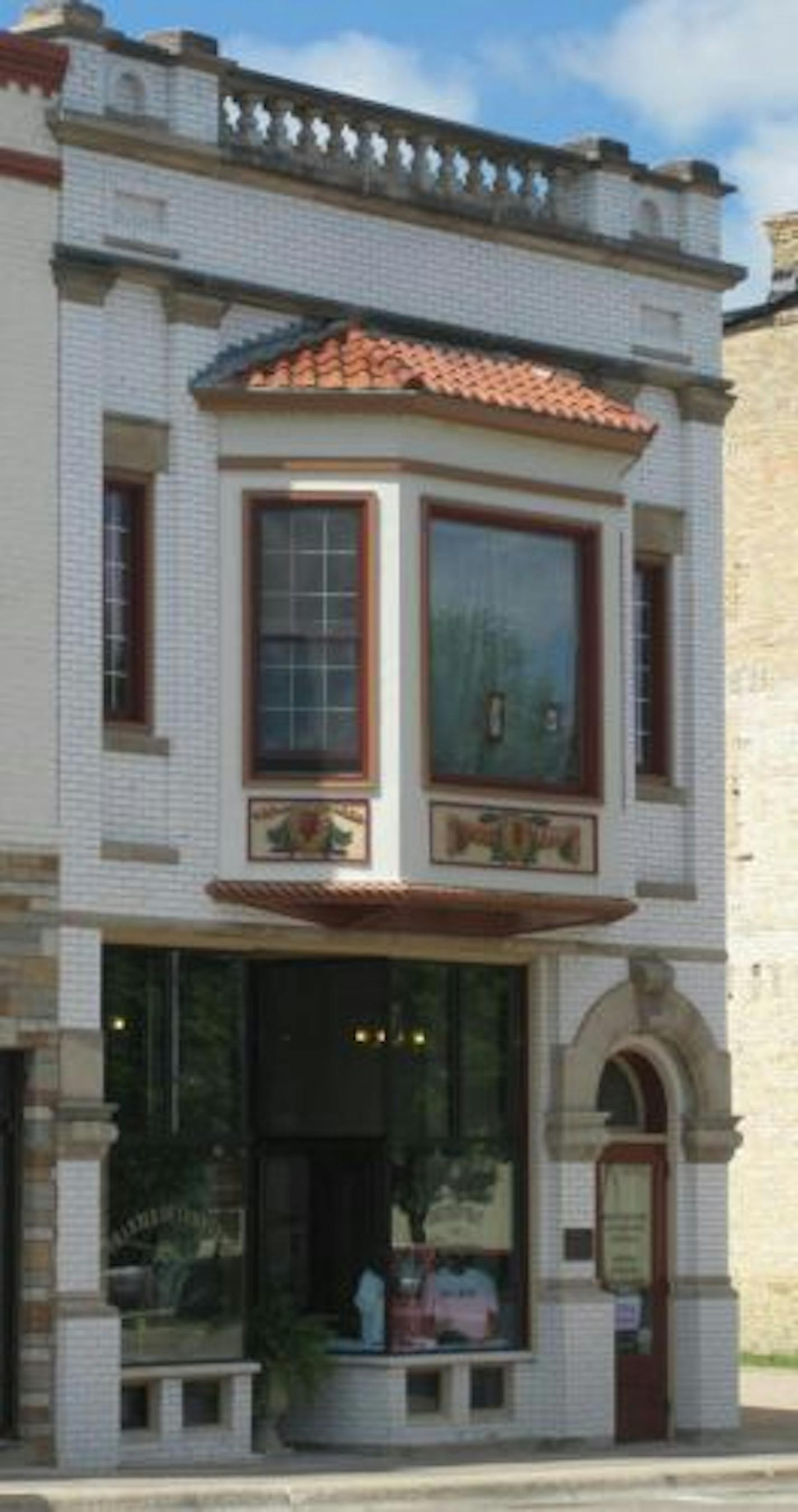 The two-story Morris building, a former jewelry store, is one of about 30 buildings located in the downtown's historic business district, which was placed on the National Register of Historic Places in 1984.