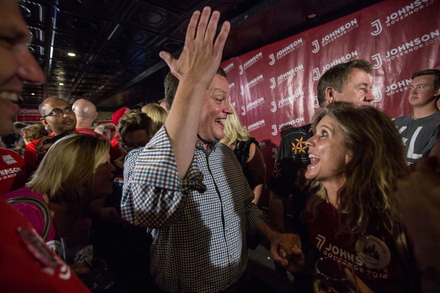 Jeff Johnson greets his supporters at the watch party after giving his victory speech.