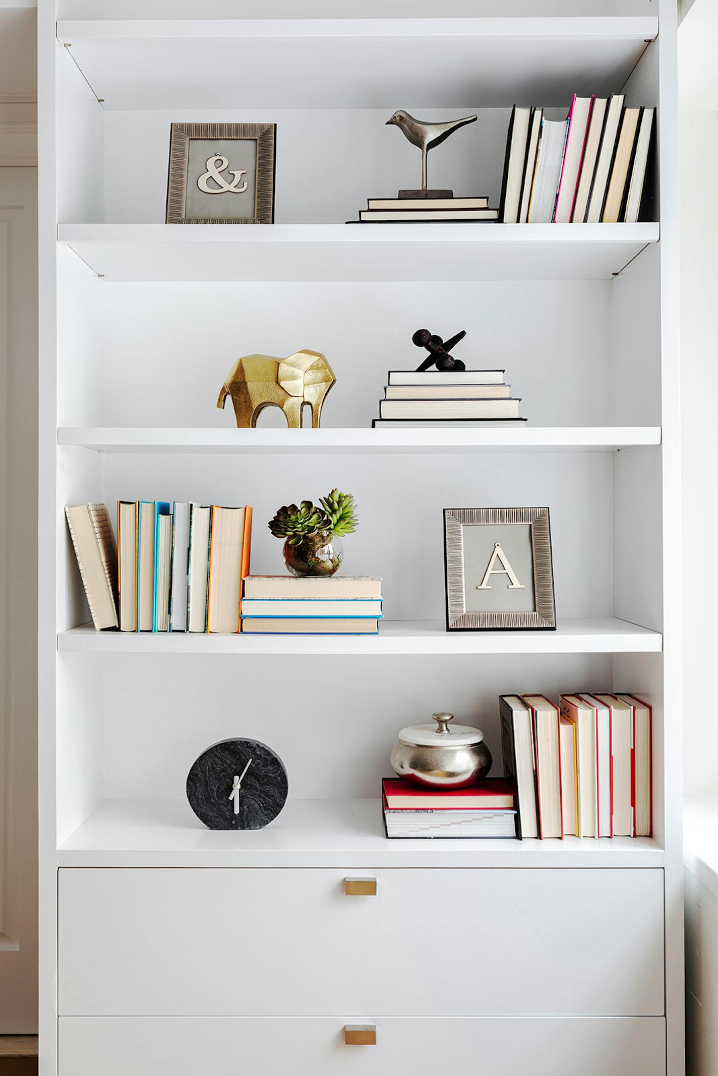 A built in bookcase displays an appealing mix of accessories and accents. (Handout/TNS)