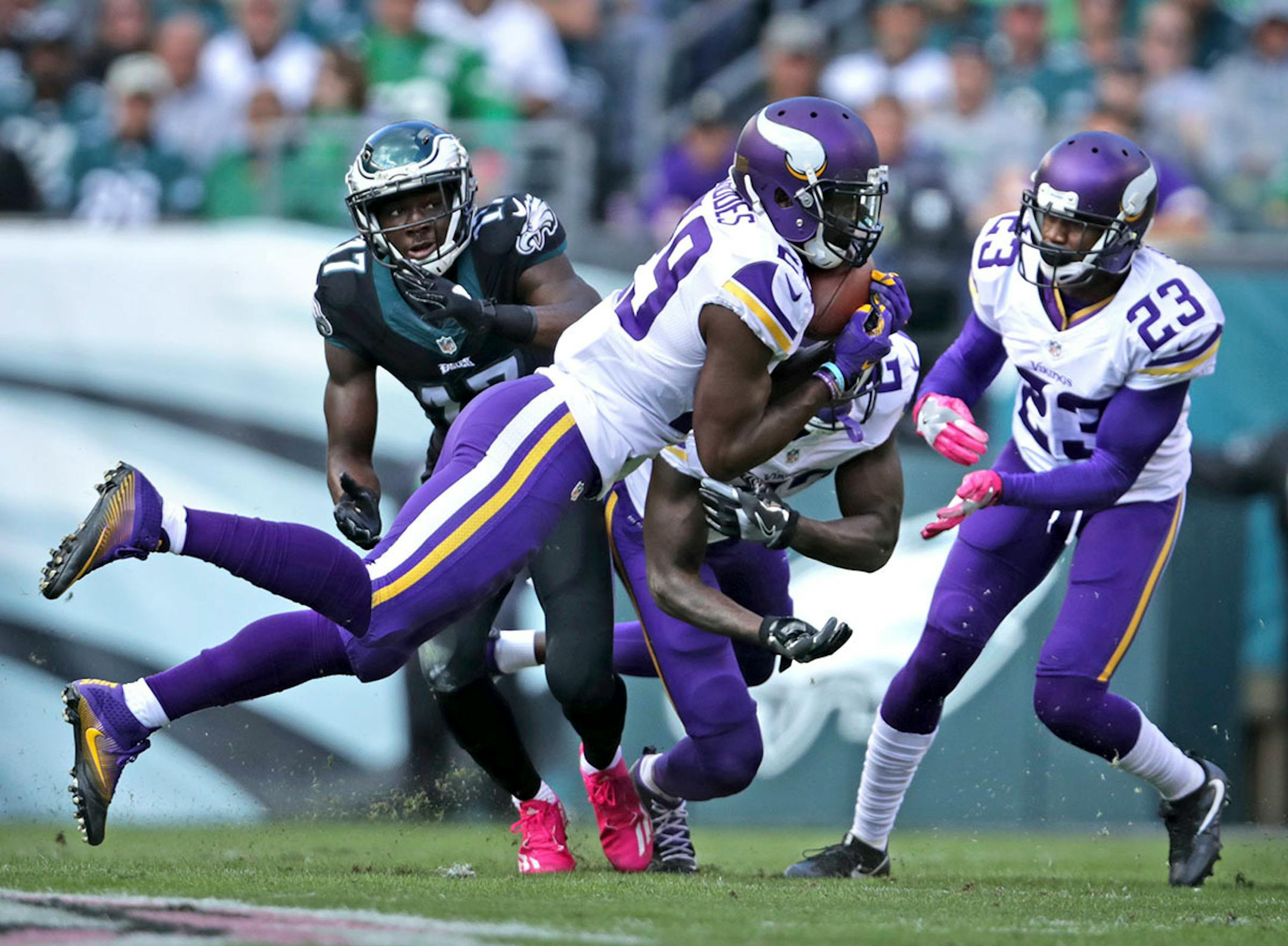 It was a crazy first half with neither team wanting to score. Here Vikings Xavier Rhodes picks off a Carson Wentz pass intended for Nelson Agholor in the 1st half.