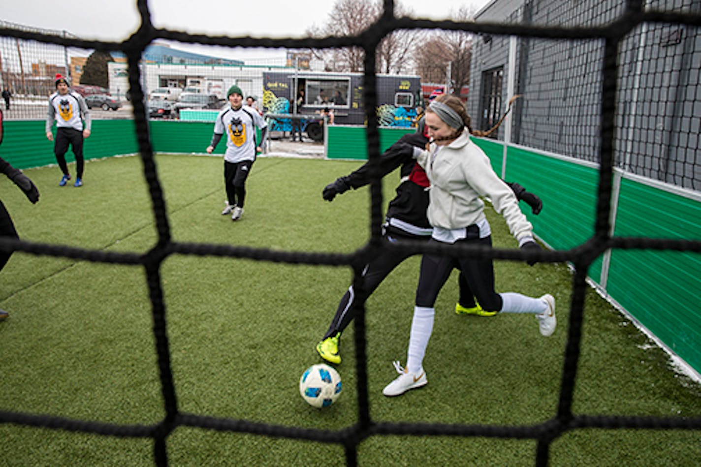 Emily Segura, right, of Edina, maneuvered the ball during a 3-on-3 soccer game while competing in La Doña Cervecería's Fútbol and Social Club.