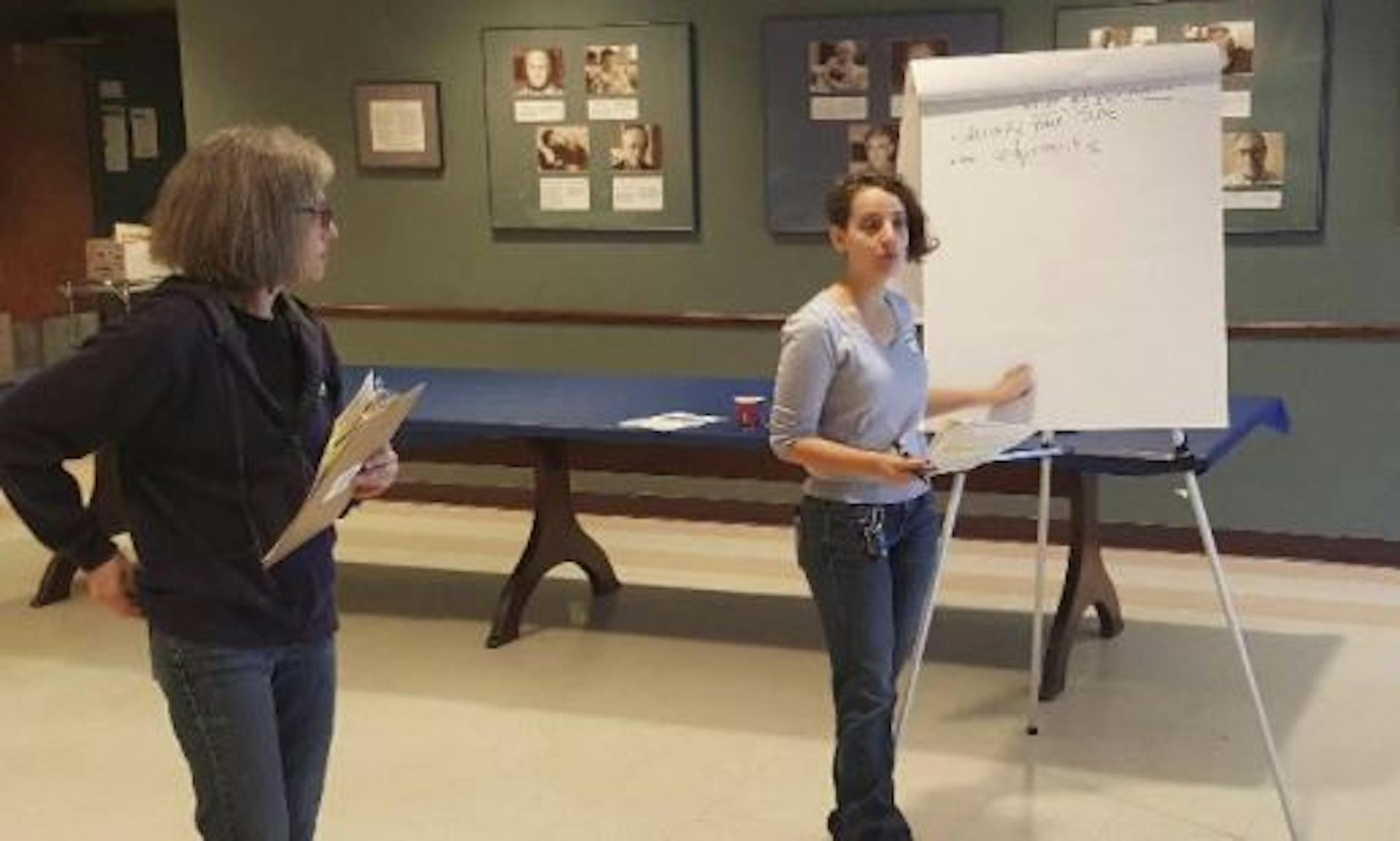 Jewish Community Action organizer Rachel English speaks to volunteers at Beth Jacob Congregation in Mendota Heights in early Novembers. Volunteers used a new social justice tool called "deep canvassing" where they knock on doors and start personal conversations about racism in hopes of improving equity in Minnesota. Shannon Prather, Star Tribune