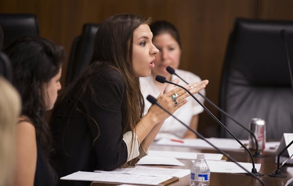 Revenge porn victim Chrissy Chambers of Los Angeles testifies during a working group on revenge porn law at the State Office Building in St. Paul on S