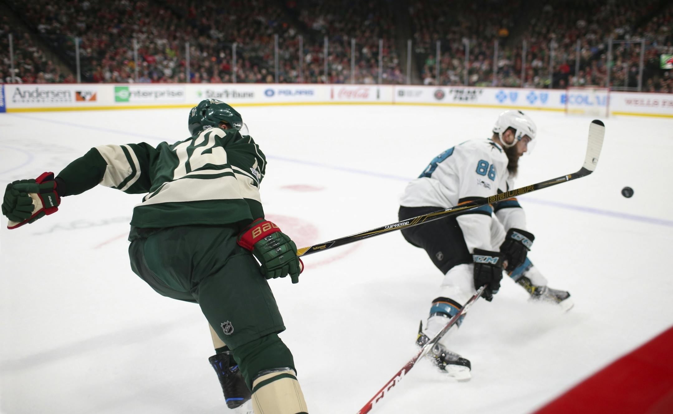 Wild center Eric Staal poked the puck past Sharks defenseman Brent Burns at mid-ice before breaking away with it for an empty-net goal in the third period of a 3-1 victory over San Jose on Sunday.