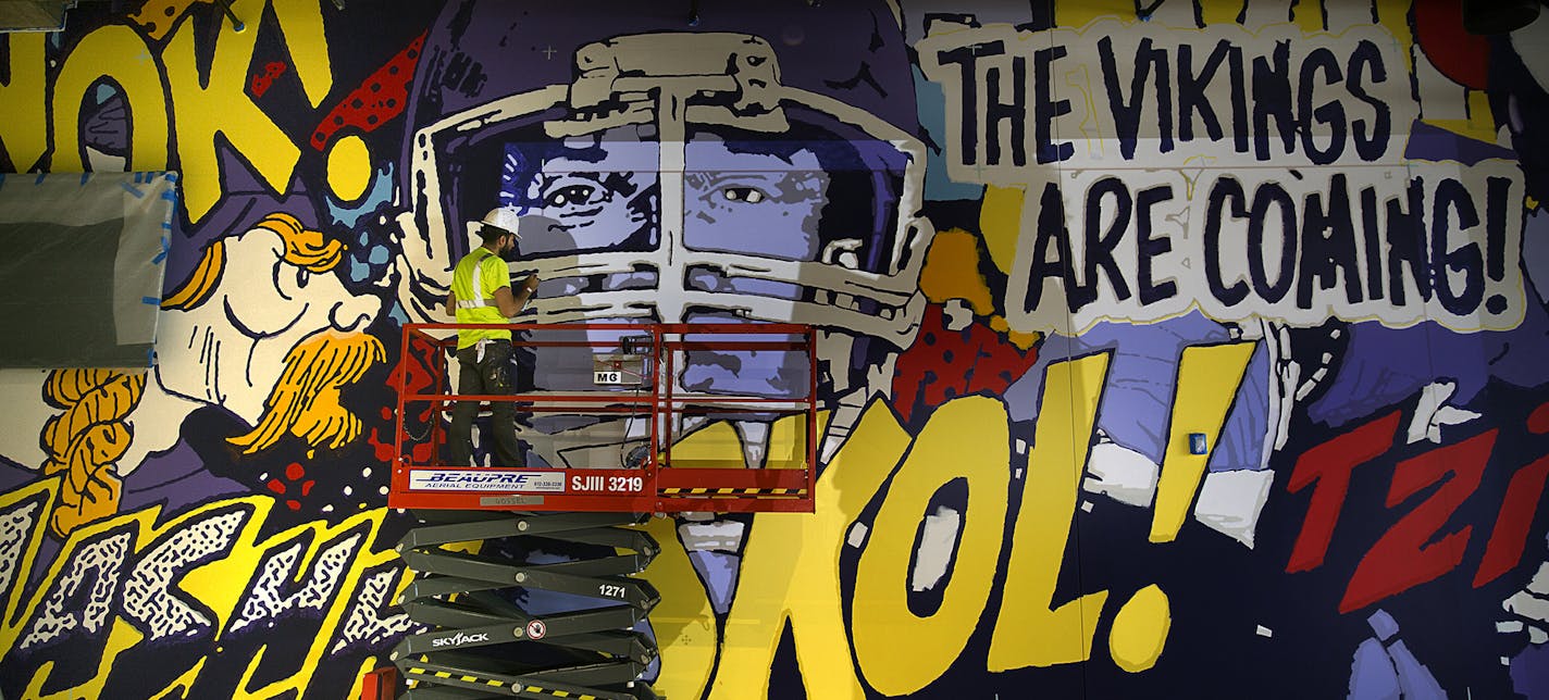 A huge mural is nearly finished in a corridor at US Bank Stadium. ] JIM GEHRZ&#xef;james.gehrz@startribune.com (JIM GEHRZ/STAR TRIBUNE) / June 28, 2016/ 10:00 AM , Minneapolis, MN - BACKGROUND INFORMATION: Pix for special section for the opening of the new US Bank Stadium. You will be shooting photos for the special tab section. LEAVE FROM THE OFFICE AT 9:30 -- YOU'LL BE WALKING OVER WITH JENNI AND MARK V. These are photos that we need shot while you are over there: Glamour shot inside stadium s