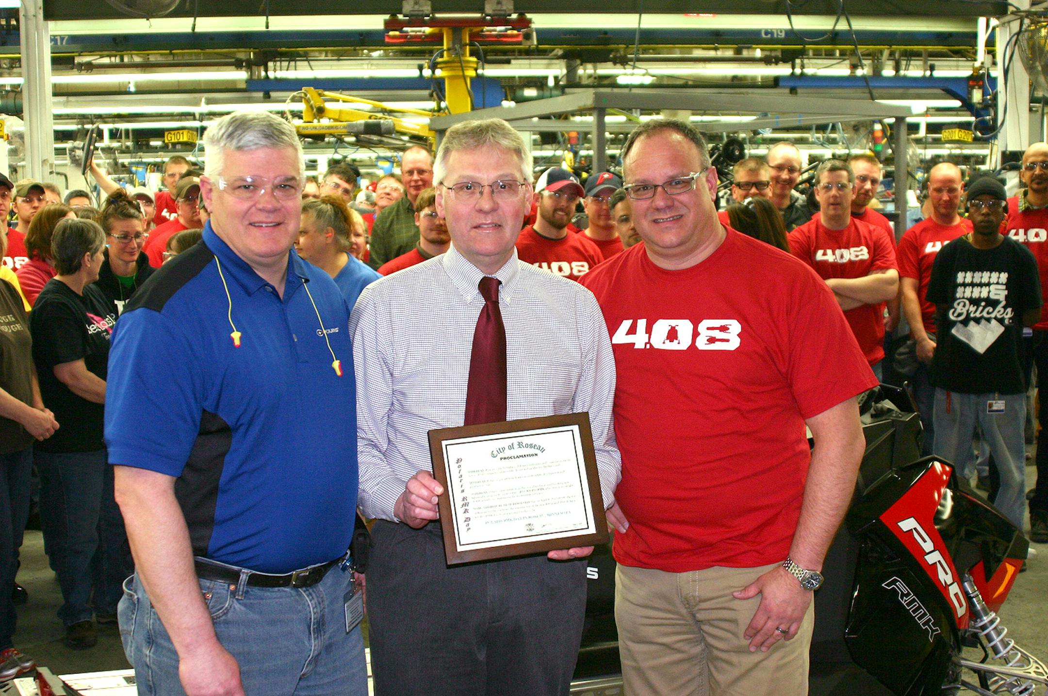 From Left to Right.. Dalton Pierce, Polaris Plant Director in Roseau Mayor Jeff Pelowski, Mayor of Roseau Bill Miller, Polaris Director of Snowmobile Engineering
