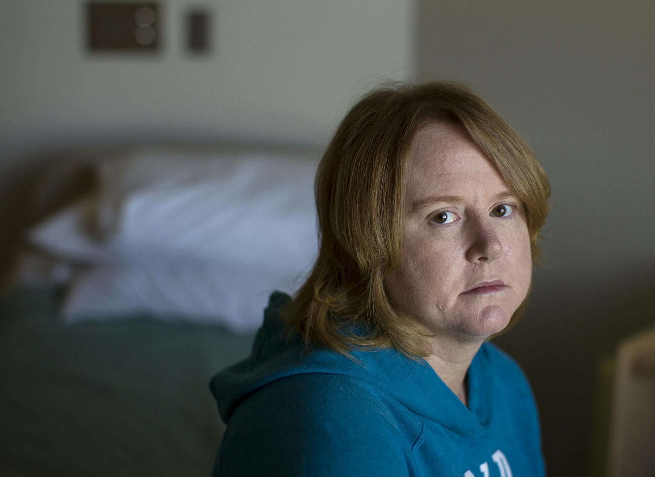 Jennifer Dunbar, a patient in the psychiatric ward at Mercy Hospital in Coon Rapids, photographed in her room October 6, 2014. (Courtney Perry/Special to the Star Tribune)