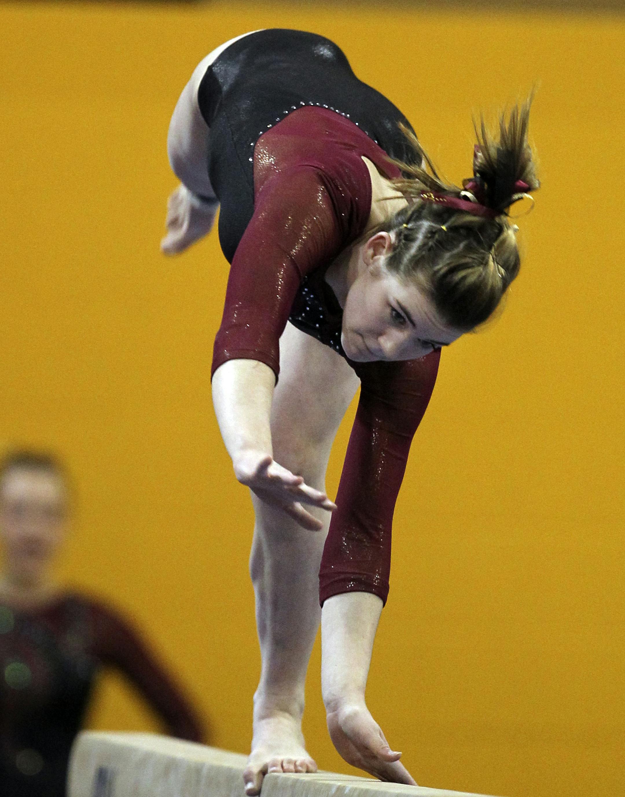 Northfield High's Bailey DuPay competes in the balance beam during the Minnesota State High School state girls 2A team championshipsFriday, Feb. 22, 2013, at the U of M Sports Pavilion in Minneapolis, MN. (DAVID JOLES/STARTRIBUNE) djoles@startribune.com The Minnesota State High School state girls 2A team championships Friday, Feb. 22, 2013, at the U of M Sports Pavilion in Minneapolis, MN. ORG XMIT: MIN1302221915490922