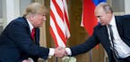 FILE -- President Donald Trump meets with President Vladimir Putin of Russia at the Presidential Palace in Helsinki, July 16, 2018. "The presidential 