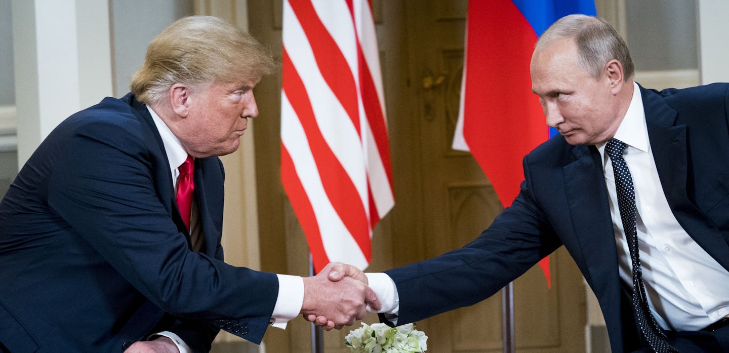 FILE -- President Donald Trump meets with President Vladimir Putin of Russia at the Presidential Palace in Helsinki, July 16, 2018. "The presidential oath of office contains 35 words and one core promise: to 'preserve, protect and defend the Constitution of the United States.' Since virtually the moment Donald J. Trump took that oath two years ago, he has been violating it," David Leonhardt writes. (Doug Mills/The New York Times)