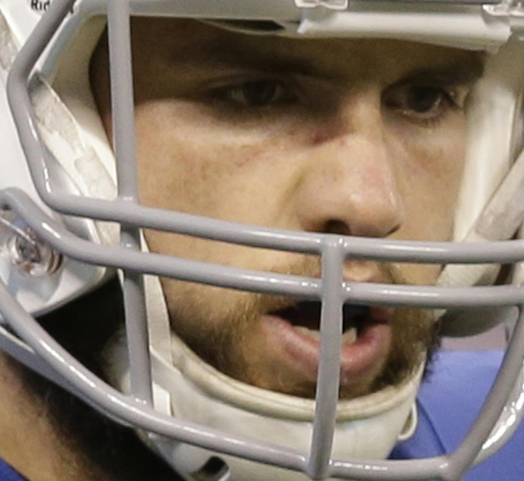 Indianapolis Colts quarterback Andrew Luck runs off the field after throwing an interception against the Houston Texans during the first half of an NFL football game in Indianapolis, Sunday, Dec. 14, 2014. (AP Photo/Darron Cummings)