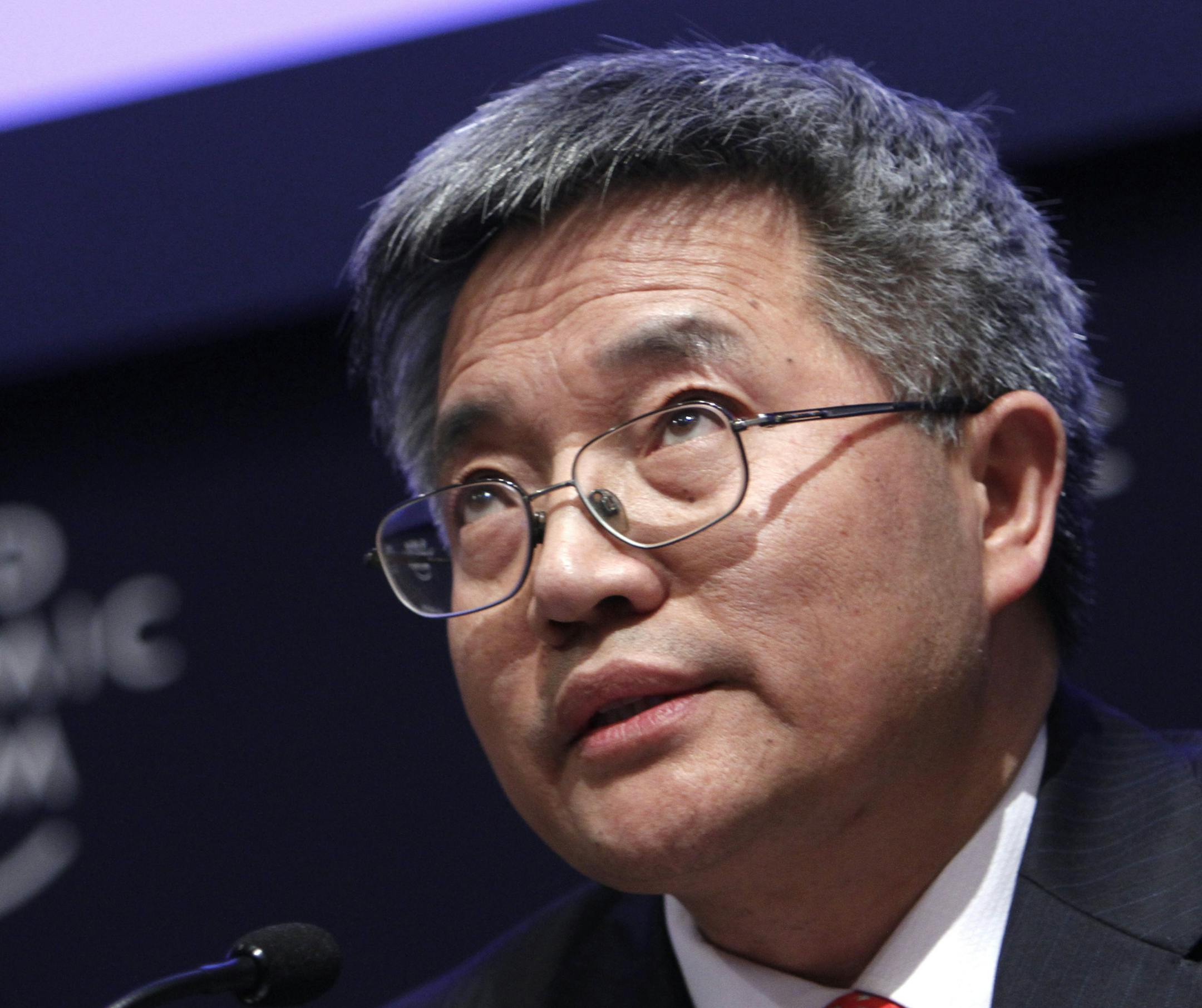 Professor of Economics, Peking University, China, Zhang Weiying speaks during a session at the World Economic Forum in Davos, Switzerland on Wednesday, Jan. 26, 2011. Buoyed by a burst of optimism about the global economy and mindful of the "new reality" that has framed it in the aftermath of the financial crisis some 2,500 business leaders, politicians and social activists will tackle an array of issues on the first day of the World Economic Forum. (AP Photo/Virginia Mayo) ORG XMIT: VLM159