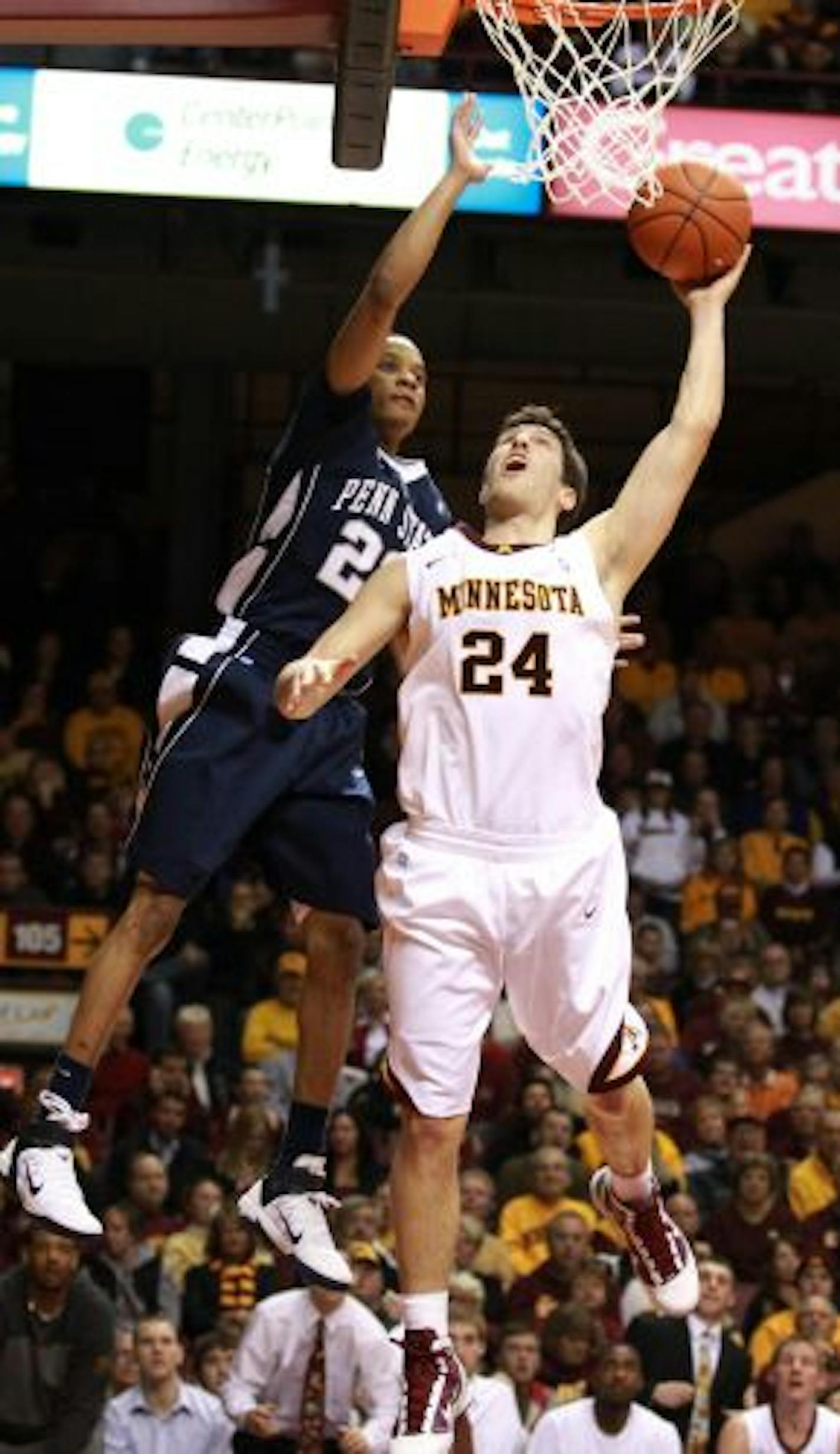 Blake Hoffarber was fouled by Tim Frazier on his way to a go-ahead three-point play, but the Gophers' lead wouldn't last long.