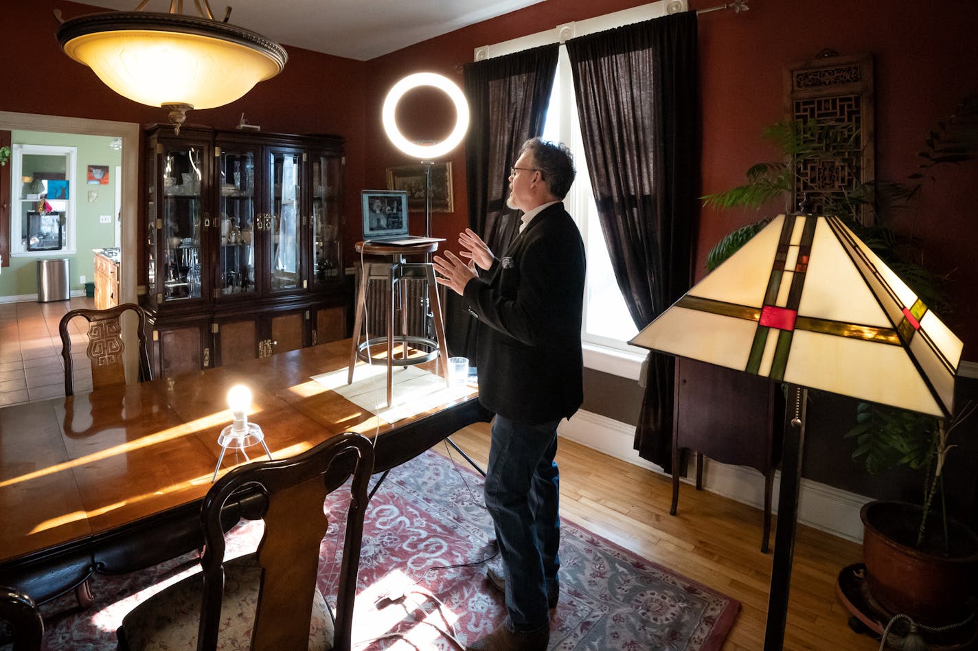 Dean Lincoln Hyers conducted a webinar training session from the dining room of his St Paul home to help attendees improve their virtual screen presence when pitching clients. Dean Lincoln Hyers is co-founder of SagePresence.