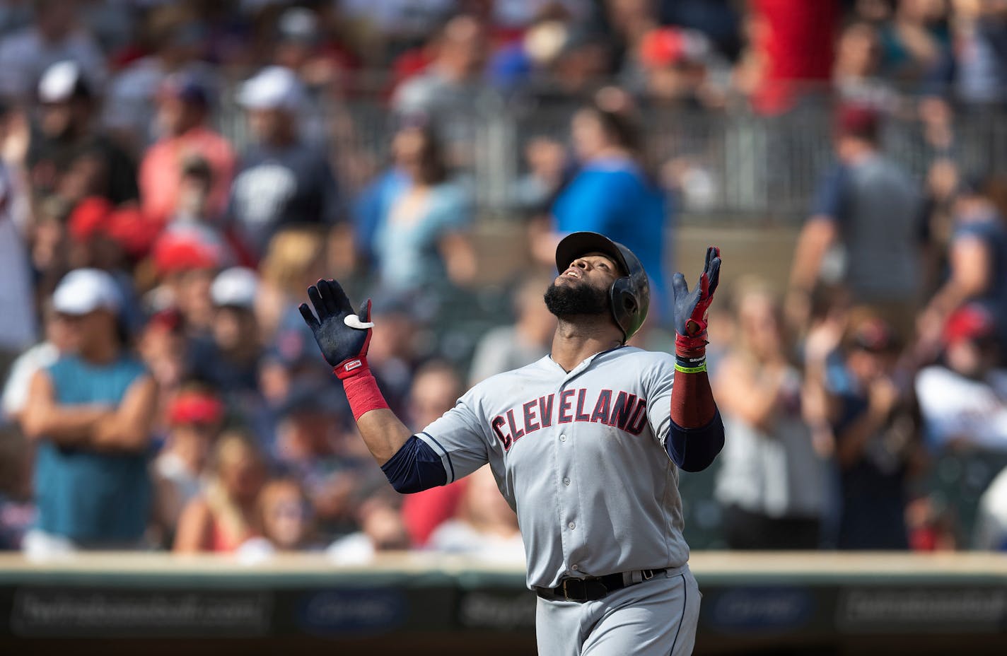 Cleveland Indians first baseman Carlos Santana (41) celebrated his grand slam homer run in the tenth inning at Target Field Sunday August 11, 2019 in Minneapolis, MN.] The Cleveland Indians beat the Minnesota Twins 7-3 in ten innings at Target Field. Jerry Holt • Jerry.holt@startribune.com