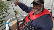 A participant from the Minnesota Veterans Home in Minneapolis showed off his “trophy” sunfish.