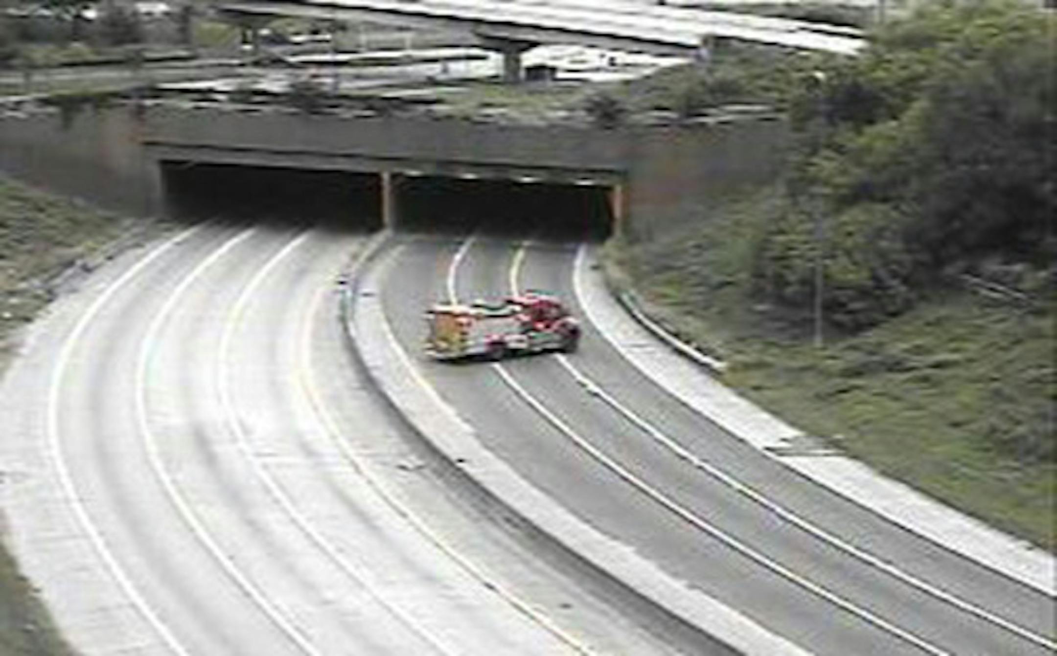 A fire truck blocks lanes to the Lowry Tunnel in Minneapolis after a reported gas leak.