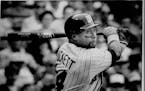 Kirby Puckett takes a swing against Milwaukee's Juan Nieves during action at Milwaukee County Stadium.