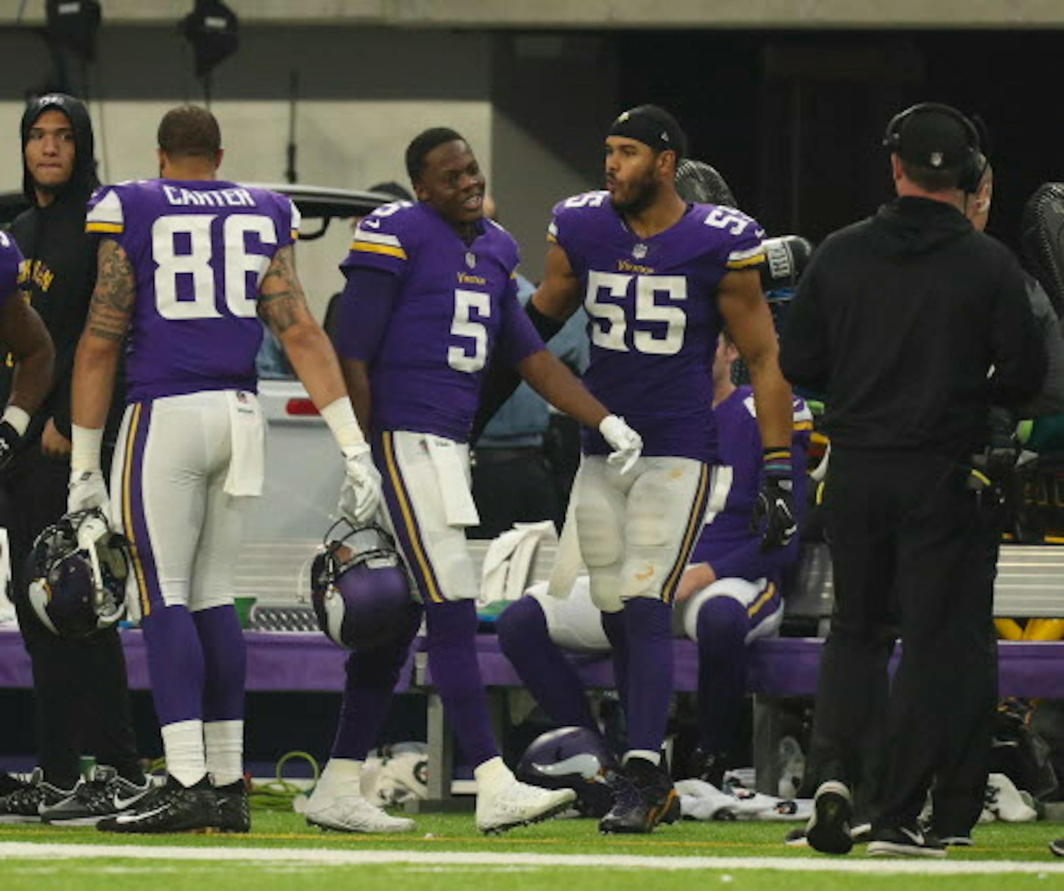 Vikings quarterback Teddy Bridgewater (5) smiled at Vikings head coach Mike Zimmer, right, as he returned to the Vikings bench after playing a fourth quarter series that ended with him throwing an interception on his first pass attempt.     ]  JEFF WHEELER ' jeff.wheeler@startribune.com