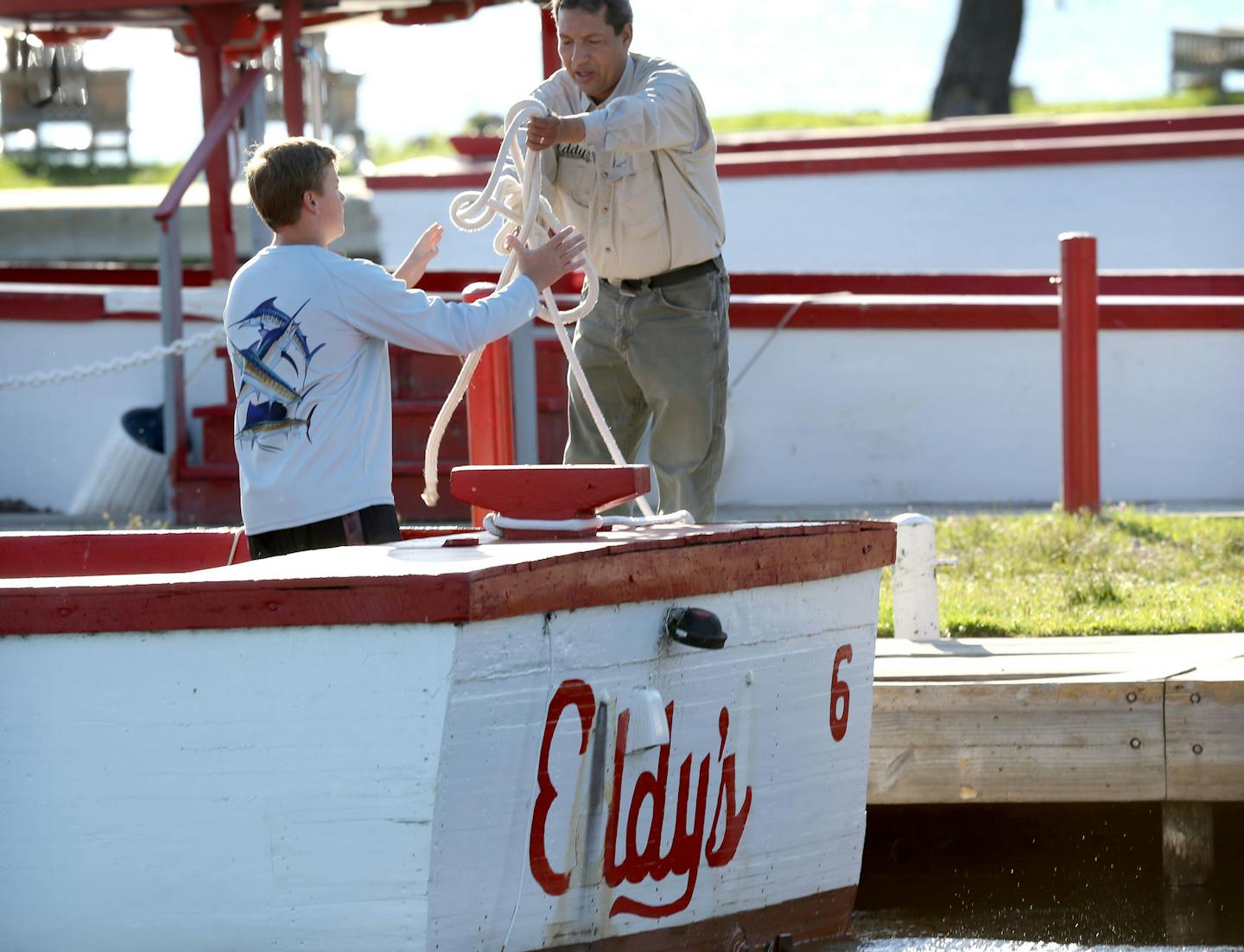 A boat from the famous Eddy's Resort, now owned by the Mille Lacs Band of Ojibwe, heads out for a fishing outing Thursday, July 30, 2015, on Lake Mille Lacs.