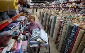 Julie McKenzie shops for fabric at SR Harris in Brooklyn Park to make a blanket for her grandson on April 14, 2025.