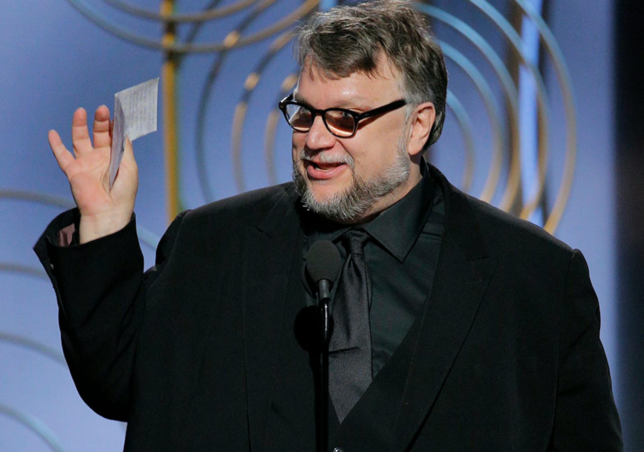This image released by NBC shows Guillermo del Toro accepting the award for best director for "The Shape of Water," at the 75th Annual Golden Globe Awards in Beverly Hills, Calif., on Sunday, Jan. 7, 2018.