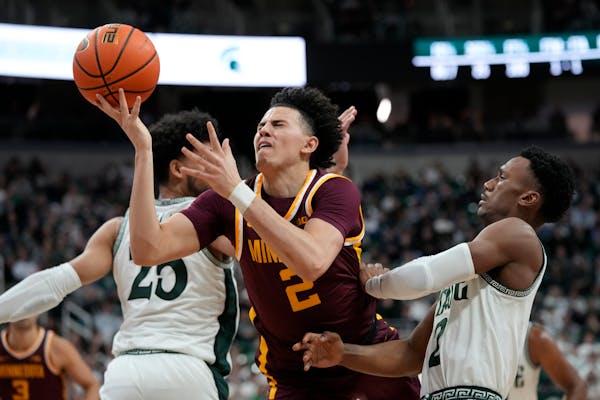 Gophers guard Mike Mitchell Jr. (2) contended with Michigan State's physicality when the teams met Jan. 18 in East Lansing.