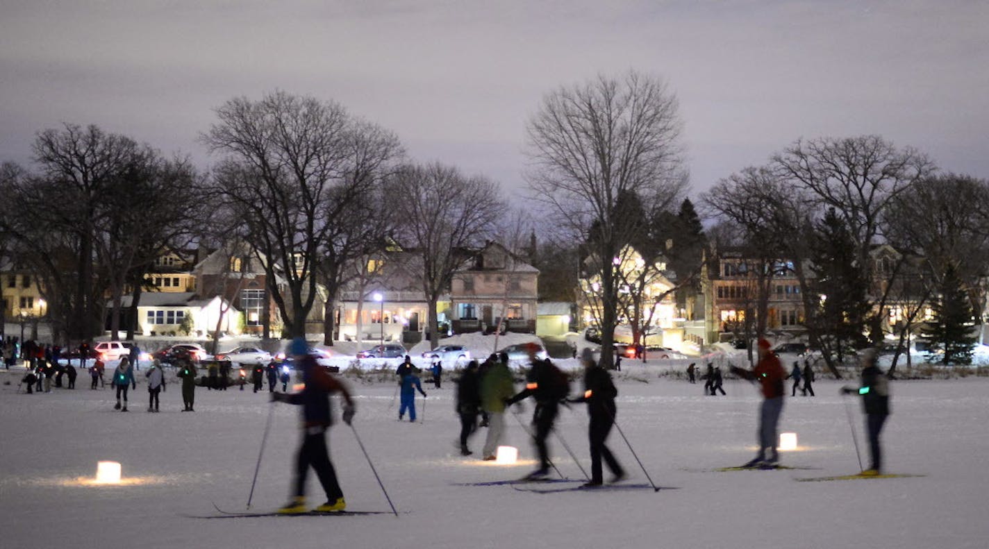 Cross country skiers made their way around Lake of the Isles during the Luminary Loppet in 2016.