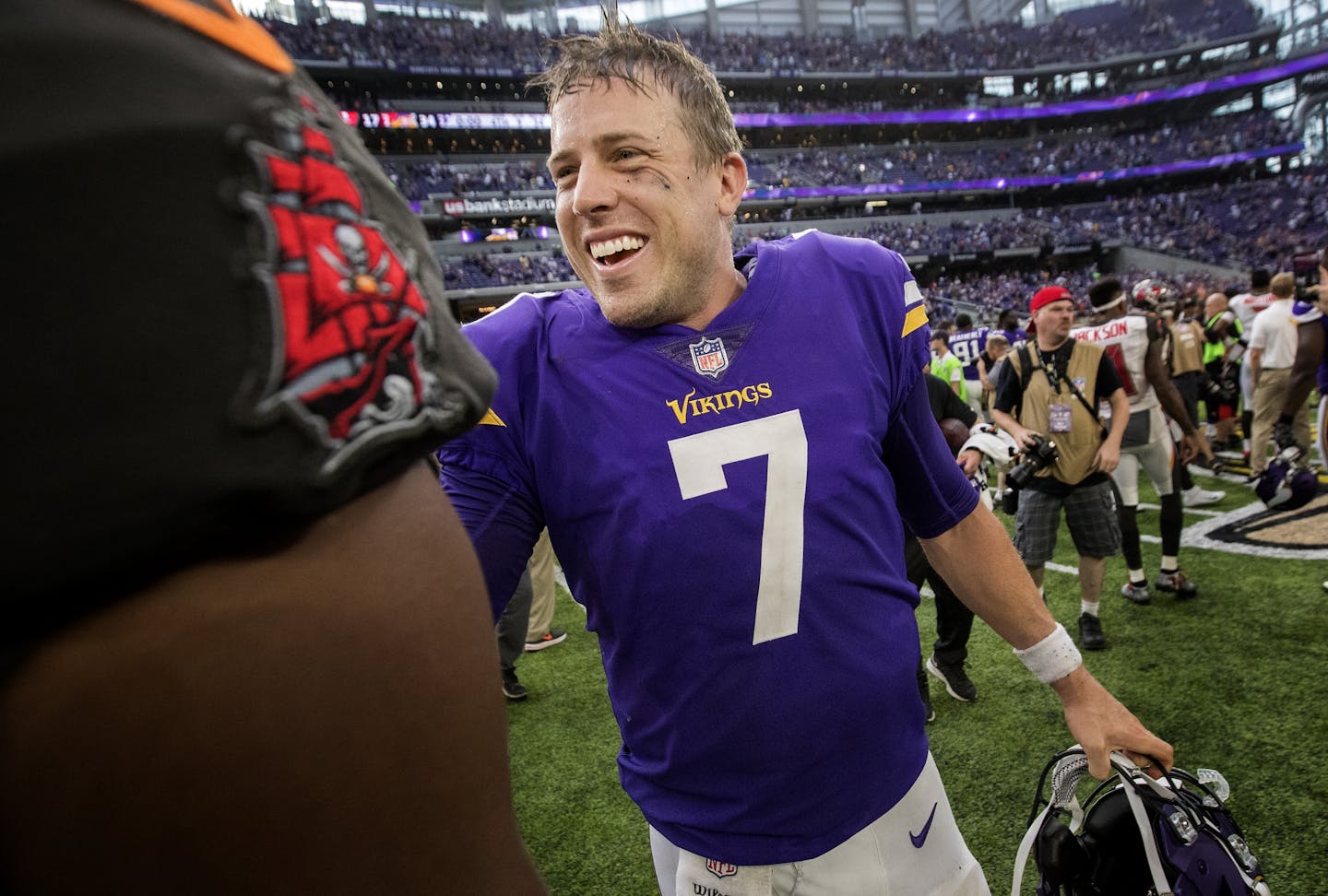 Minnesota Vikings quarterback Casey Keenum greeted players at the end of the game.