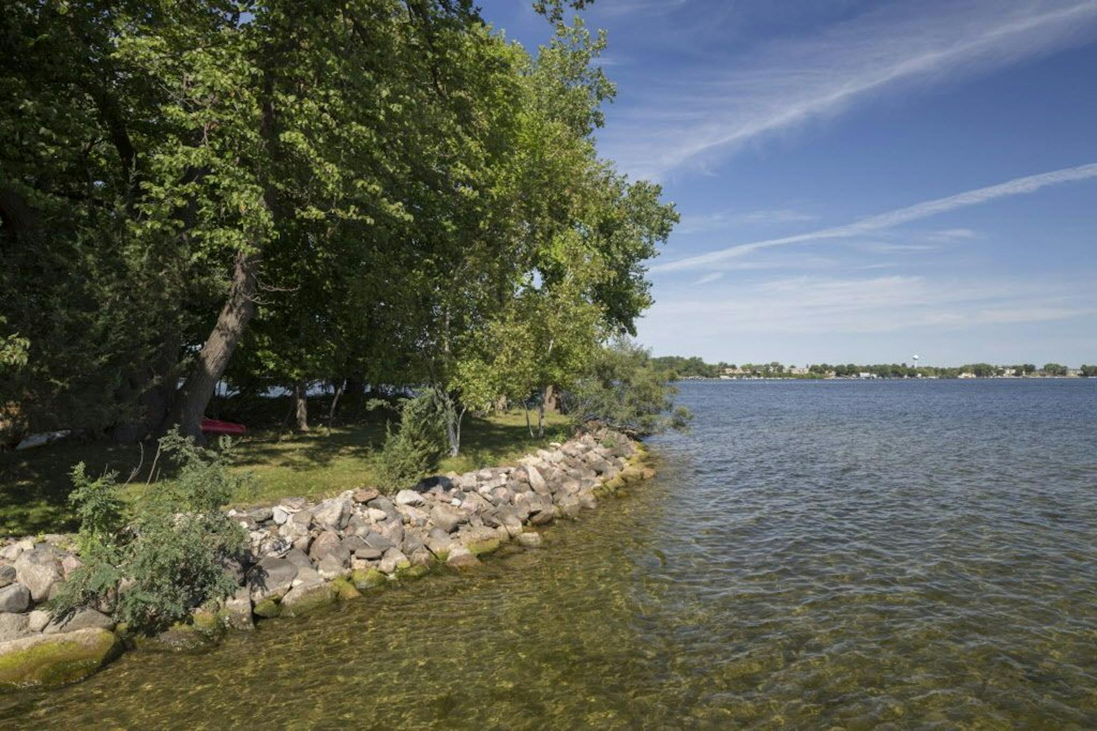 The island boasts 4,000 feet of shoreline and multiple boat slips.