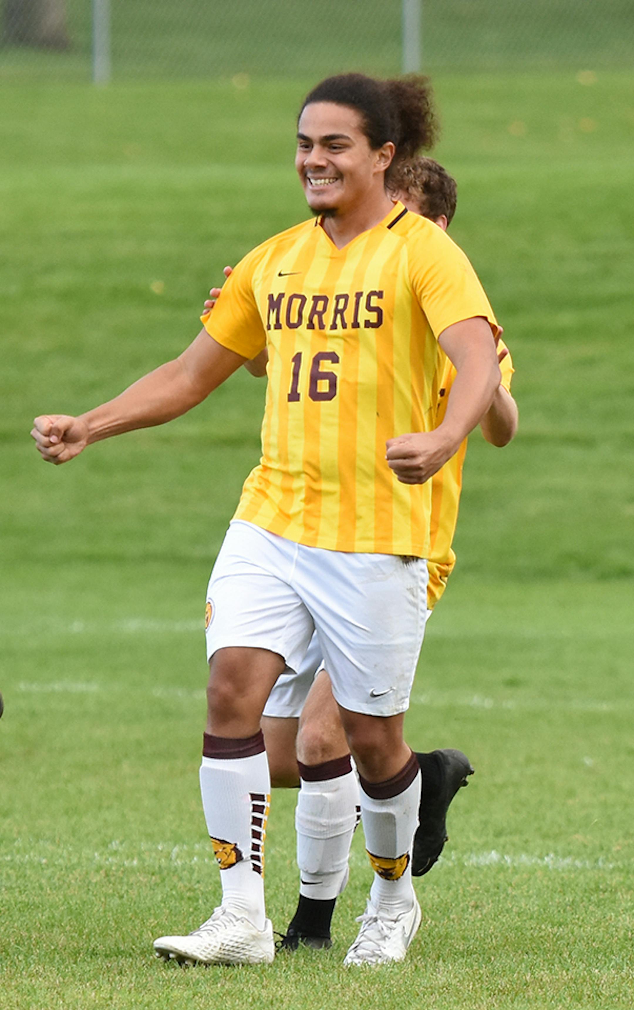 Corbin McCall, right, #16