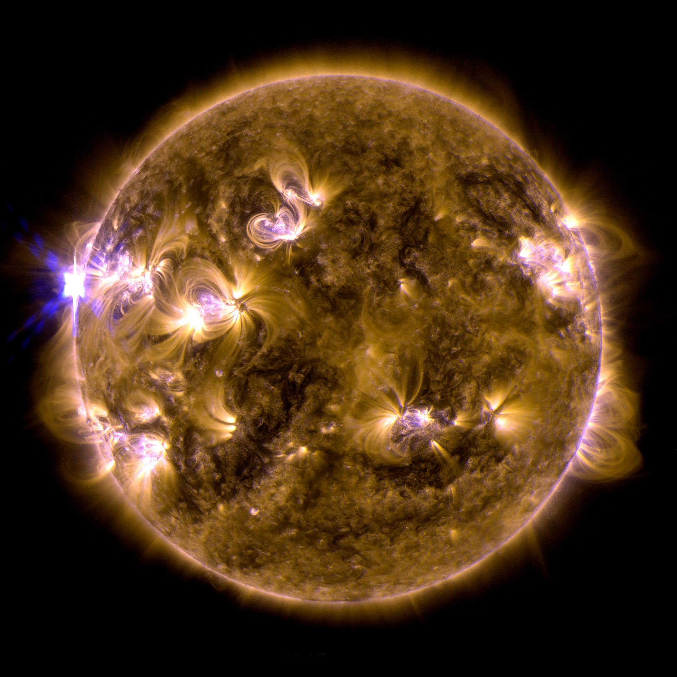 This blend of two images taken by NASA&#xed;s Solar Dynamics Observatory shows a solar eruption that occurred on May 12, 2013. One image shows light in the 171-angstrom wavelength, the other in 131 angstroms. Scientists say the Mother&#xed;s Day solar flare was the strongest of the year and occurred on the side of the sun that faced away from Earth. (AP Photo/NASA's Solar Dynamics Observatory)