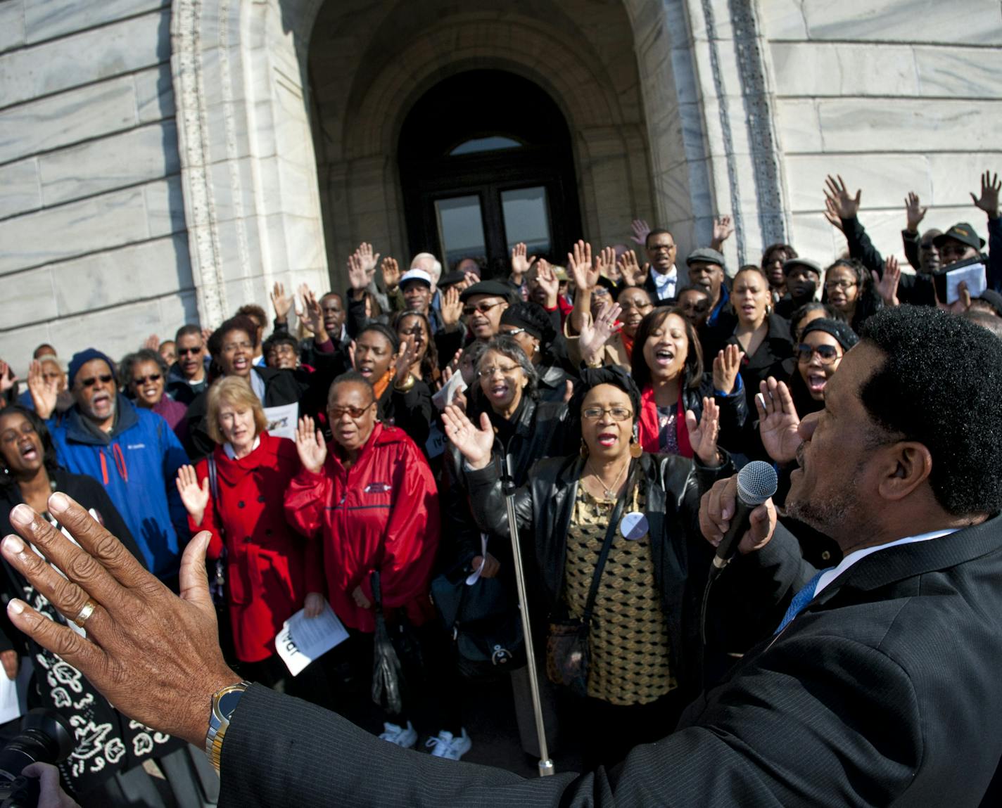 The group was told no singing was allowed in the Capitol so ISAIAH president Rev. Paul Slack led the group in a beautiful rendition of Amazing Grace and Oh Happy Day outdoors on the Capitol steps. African-American clergy and members of the faith community held a faith rally at the Minnesota State Capitol on the 45th anniversary of Dr. Martin Luther King's assassination to support a bill that would reduce racial disparities in juvenile detention and provide funding for alternatives. Thursday, Apr