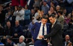 Wolves coaches Ryan Saunders, left, and Pablo Prigioni preach a system that calls for players to make decisions within a half-second.