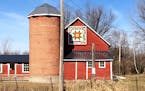 The larger-than-life &#x201c;barn quilt&#x201d; that hangs on the Herberg Century Farm in Shafer, Minn., is visible from Hwy. 8.