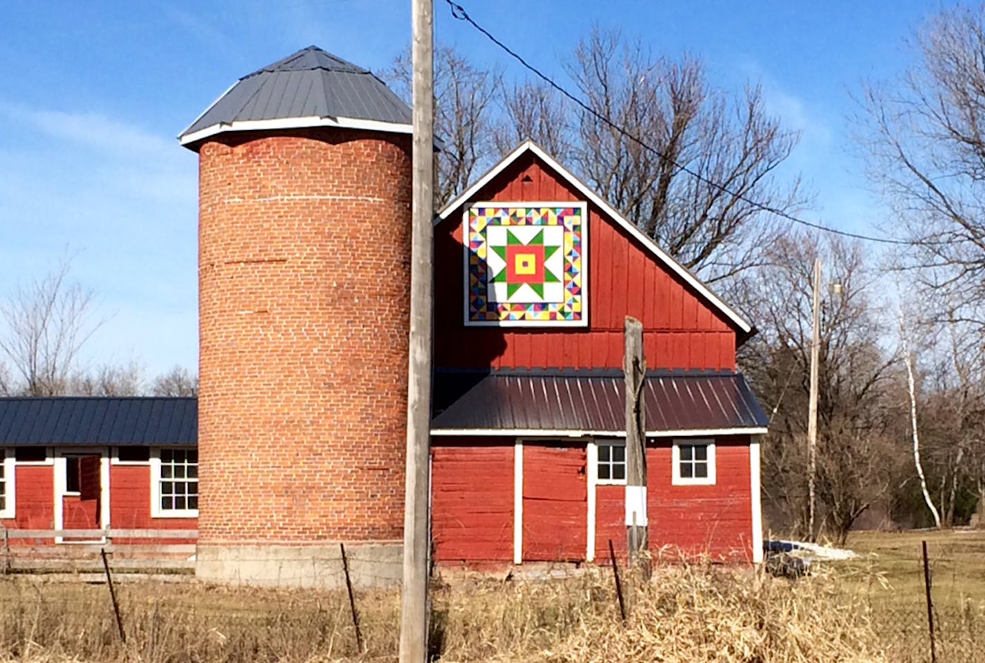 The larger-than-life &#x201c;barn quilt&#x201d; that hangs on the Herberg Century Farm in Shafer, Minn., is visible from Hwy. 8.