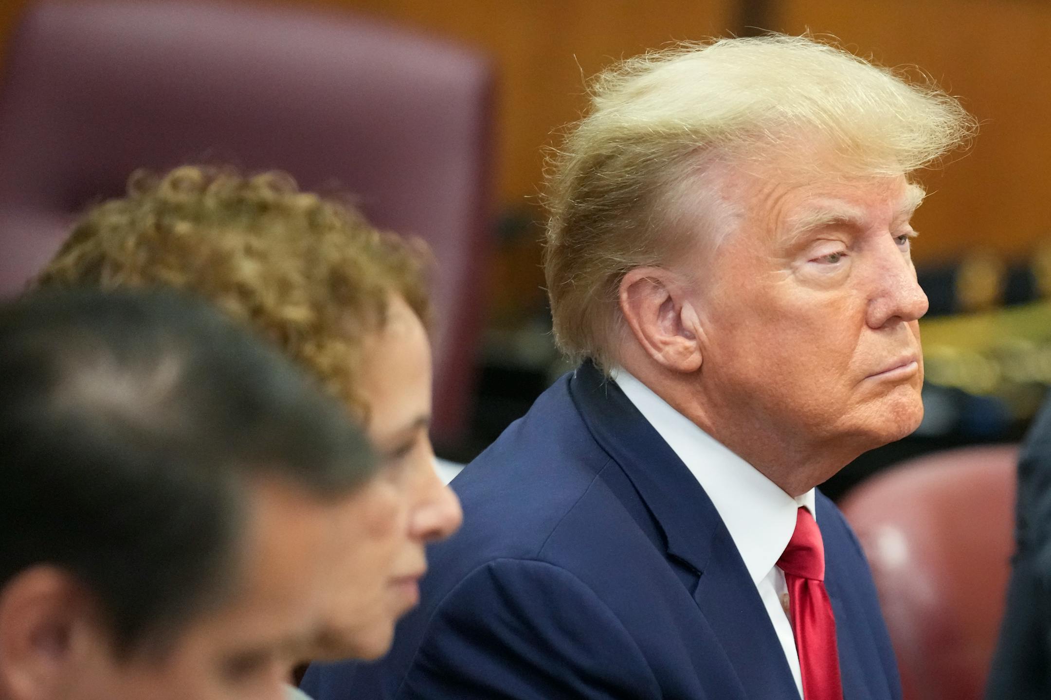 Former President Donald Trump appears in court for his arraignment, Tuesday, April 4, 2023, in New York. Trump surrendered to authorities ahead of his arraignment on criminal charges stemming from a hush money payment to a porn actor during his 2016 campaign. (AP Photo/Seth Wenig, Pool)