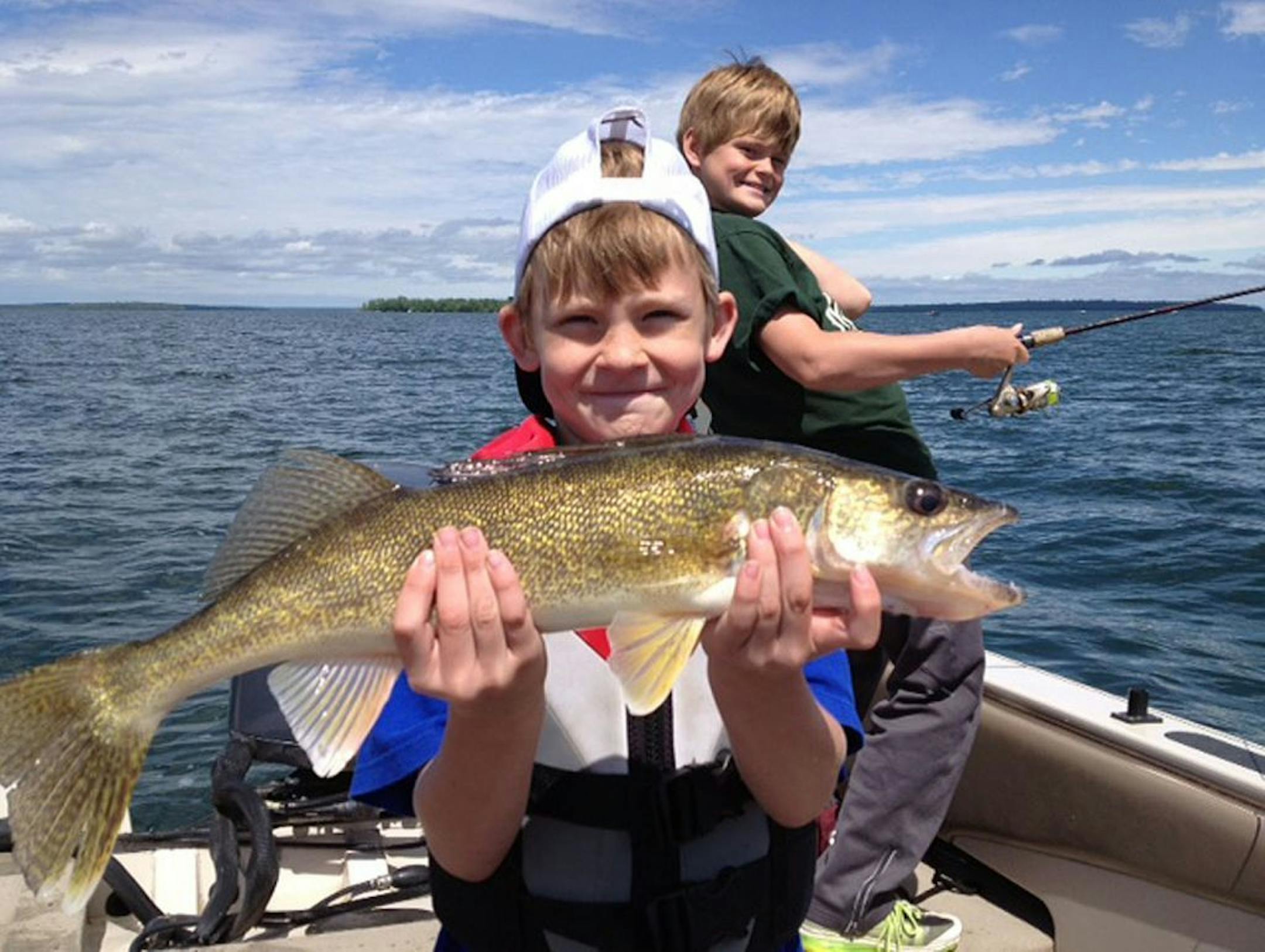 NICE FISH Fishing with his grandpa and brother on Leech Lake, 9-year-old Zack Enebak of Prior Lake caught and released this 23 -inch walleye.