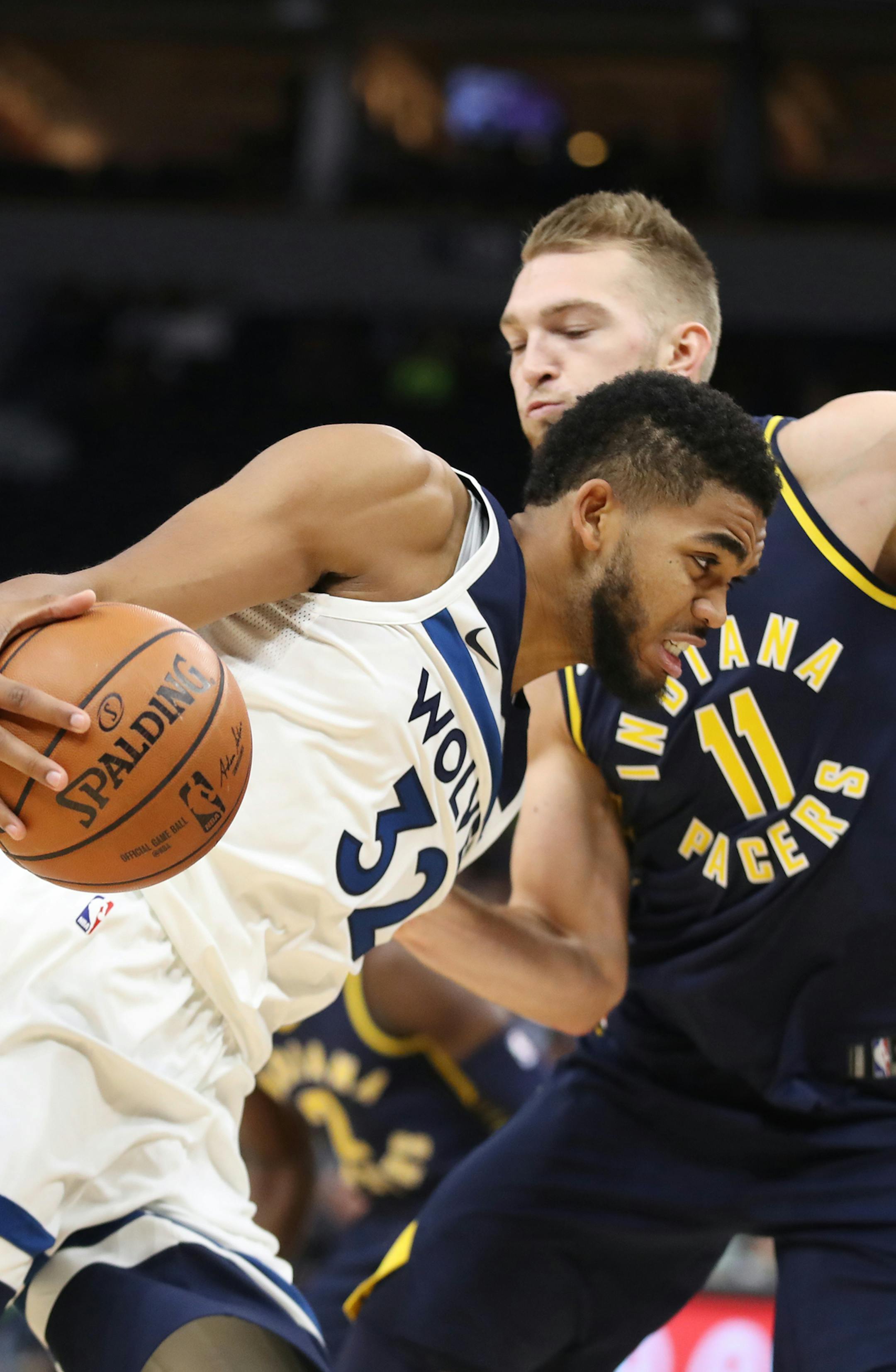 Minnesota Timberwolves center Karl-Anthony Towns (32) drove to the basket on Indiana Pacers forward Domantas Sabonis (11) in the first period at Target Center Tuesday October 24,2017 Minneapolis , MN. ] JERRY HOLT &#xef; jerry.holt@startribune.com
