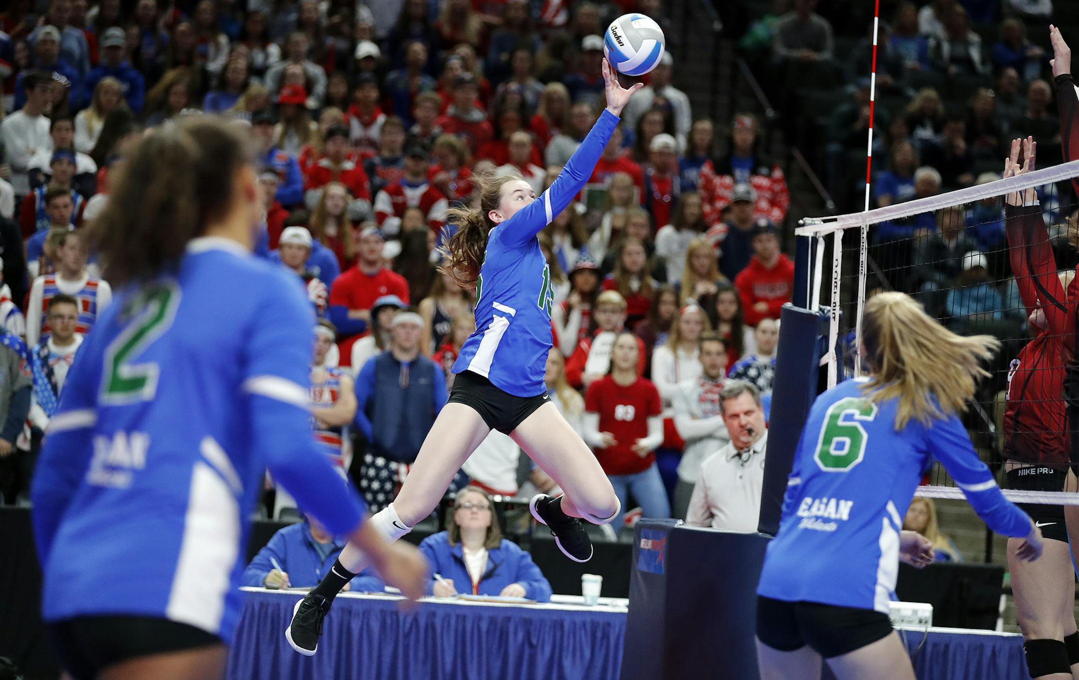 Christine Jurgens (15) of Eagan High School tips the ball. ] LEILA NAVIDI &#x2022; leila.navidi@startribune.com BACKGROUND INFORMATION: Eagan High School plays against Stillwater Area High School in the Girls Volleyball Class 3A State semifinal match at Xcel Energy Center in St. Paul on Friday, November 9, 2018. Eagan High School won the match 3-1.